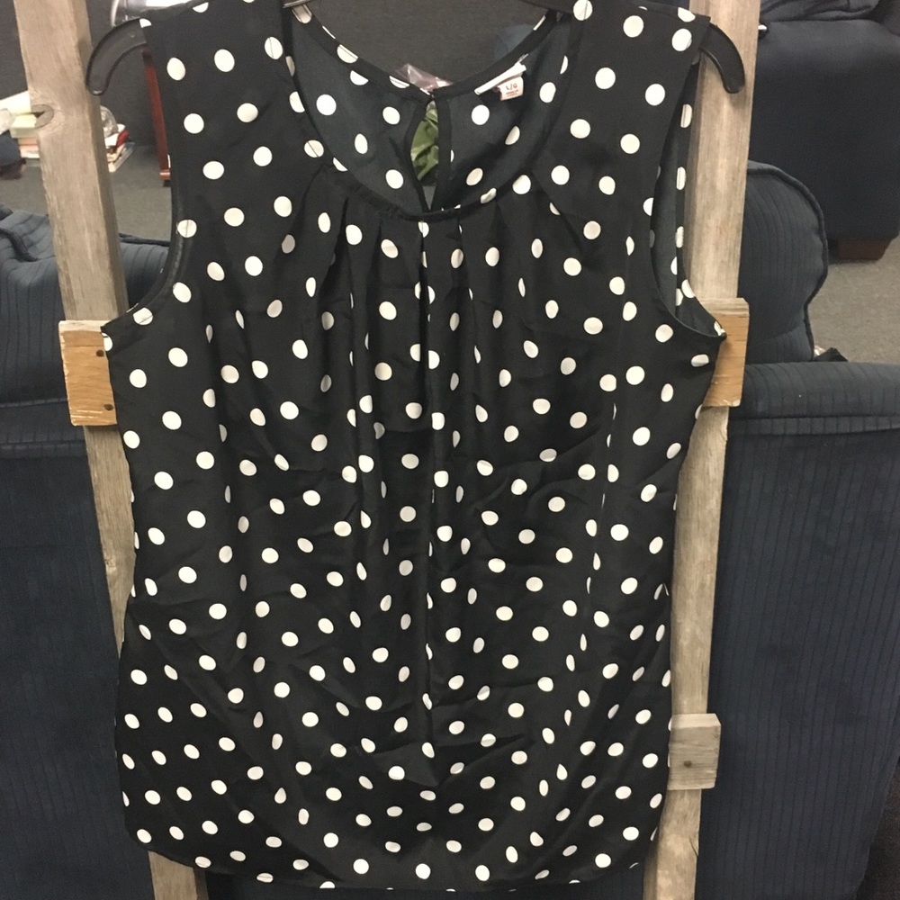 Sleeveless polka dot blouse